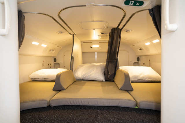 There are six narrow bunks in the cabin crew rest on Qantas' 787-9, the ...