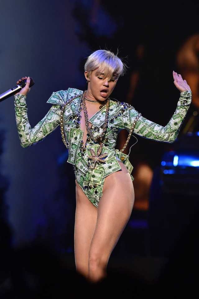 21 Of The Most Daring Looks Miley Cyrus Has Ever Worn From See Through Dresses To A Glitter 3492