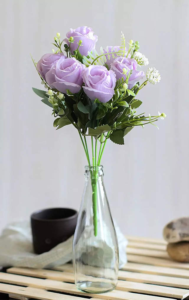 Amp up the look of your decor with these purple artificial flowers ...